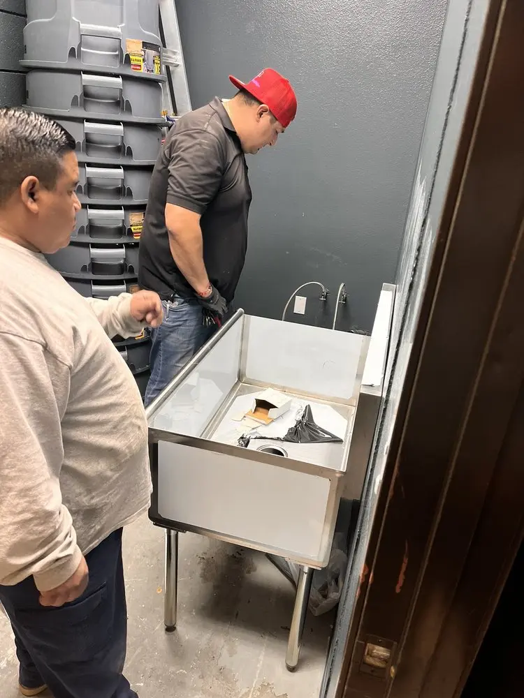 Commercial plumbing and sink installation in Clair